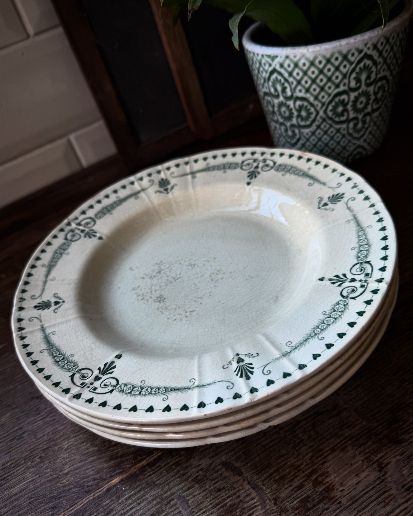 Four pretty vintage French side plates