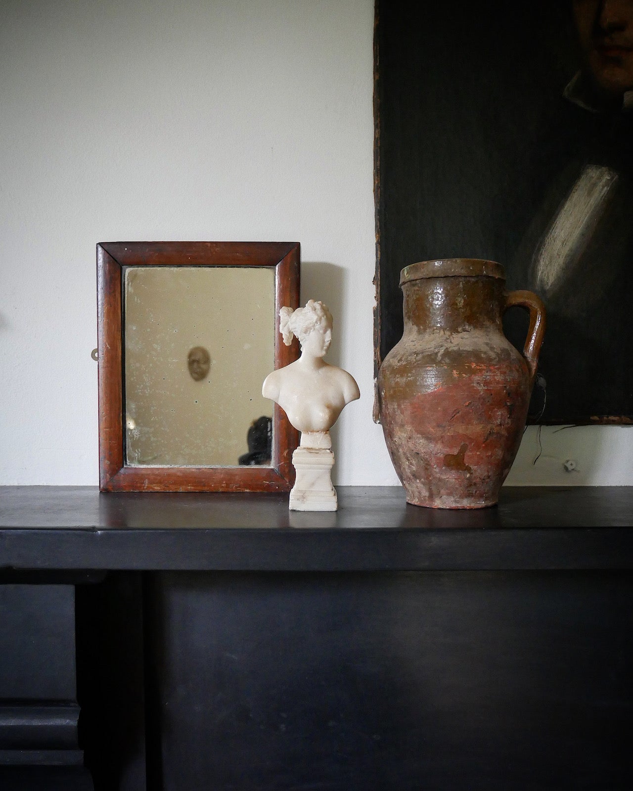 Small antique wood framed mirror