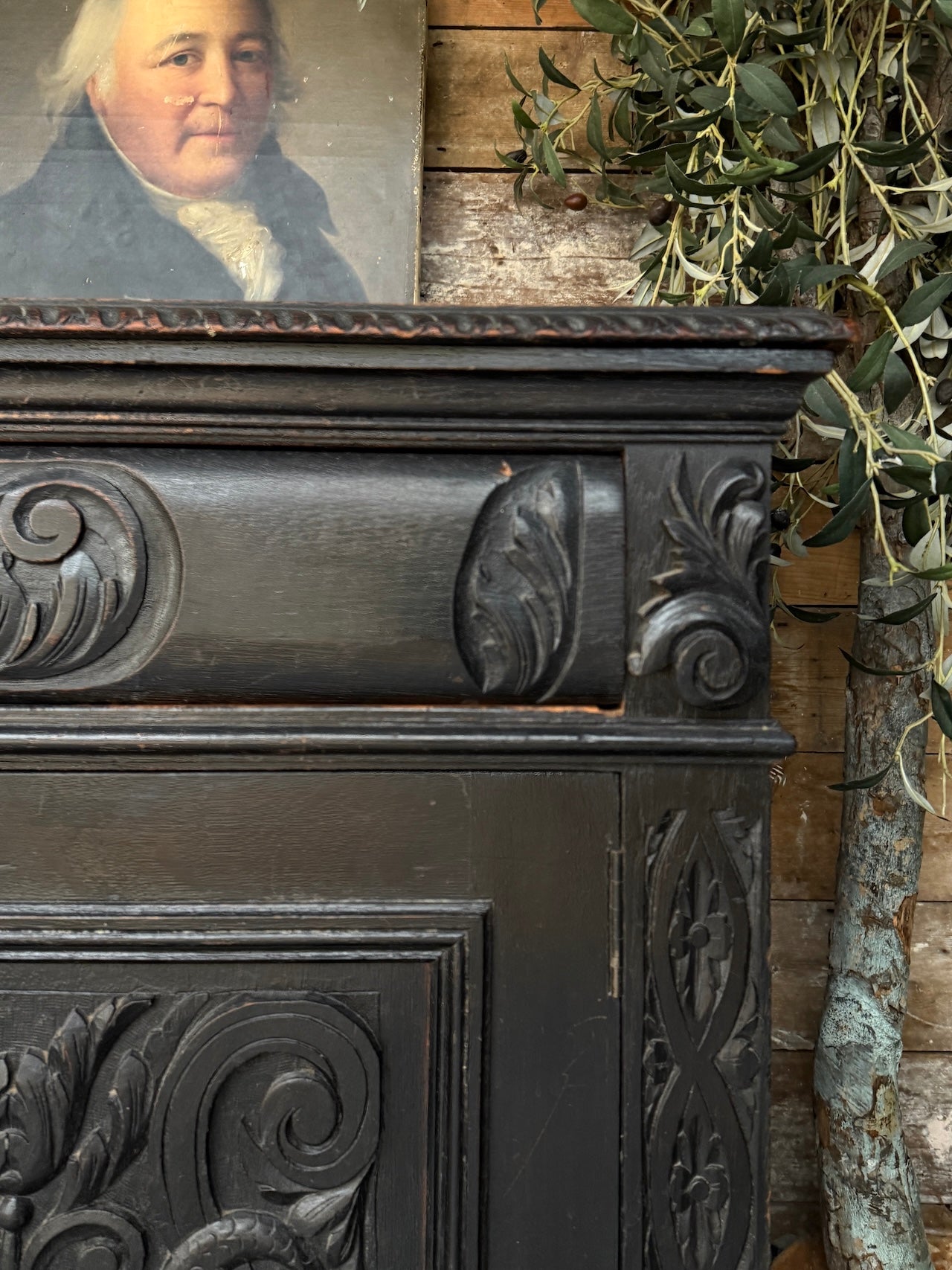 Heavily carved Victorian ebonised sideboard