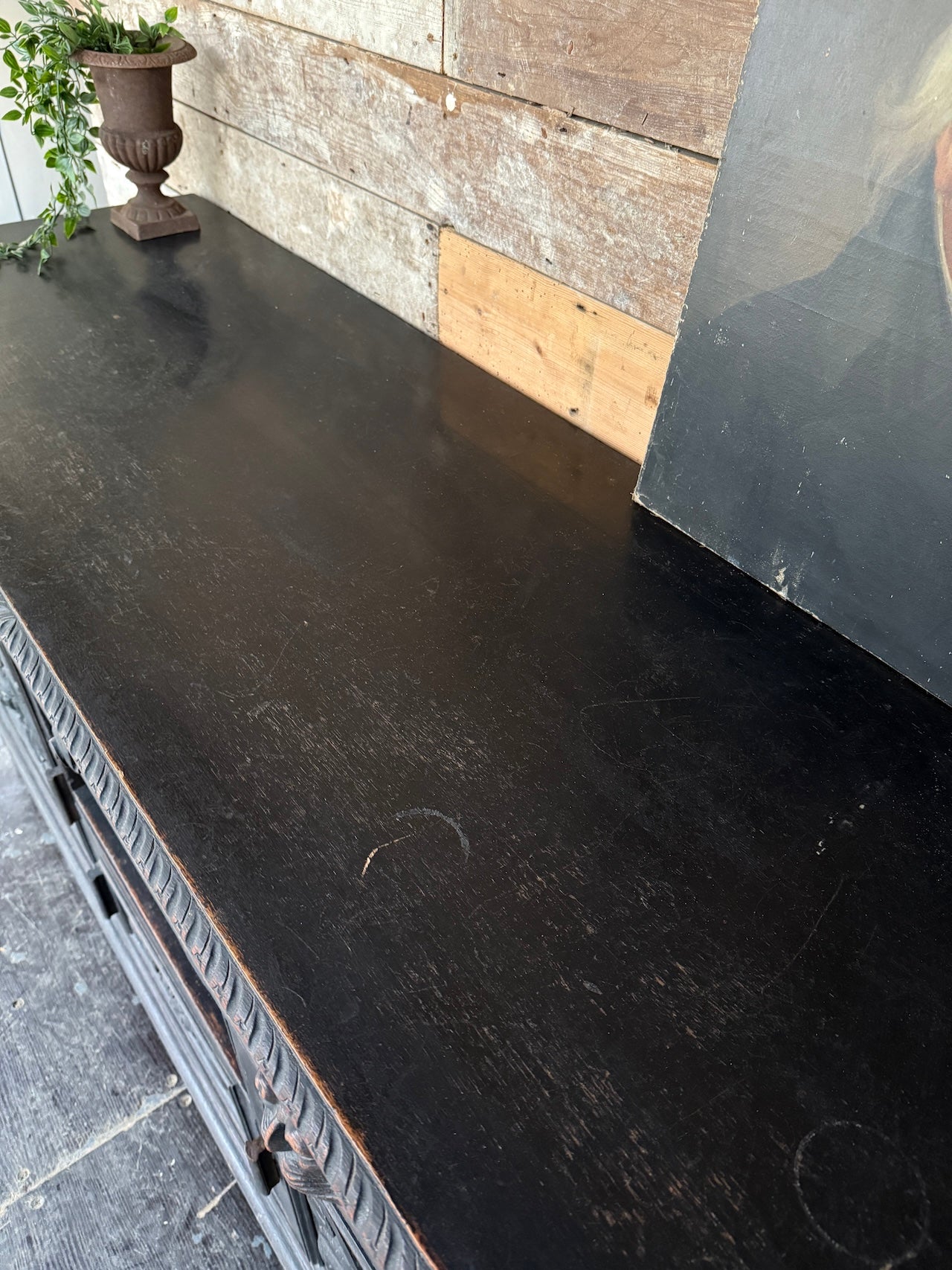 Heavily carved Victorian ebonised sideboard