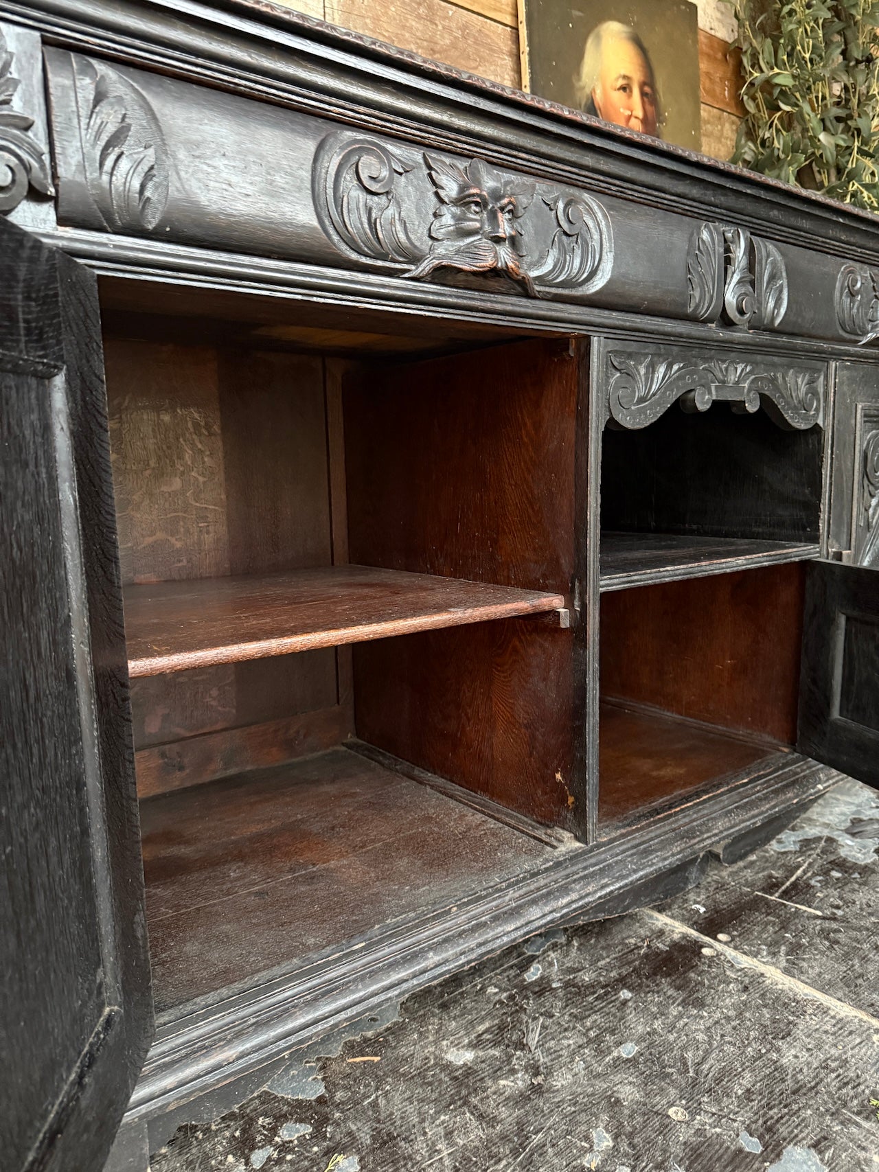 Heavily carved Victorian ebonised sideboard