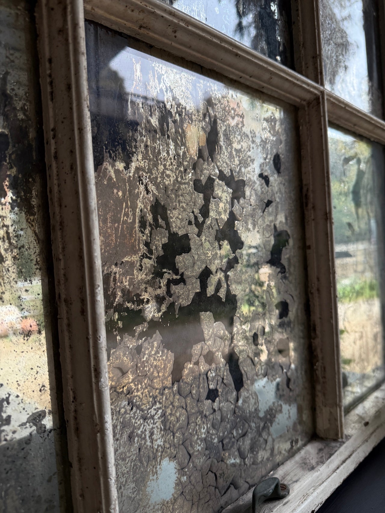 Lovely foxed French mirrored window frame