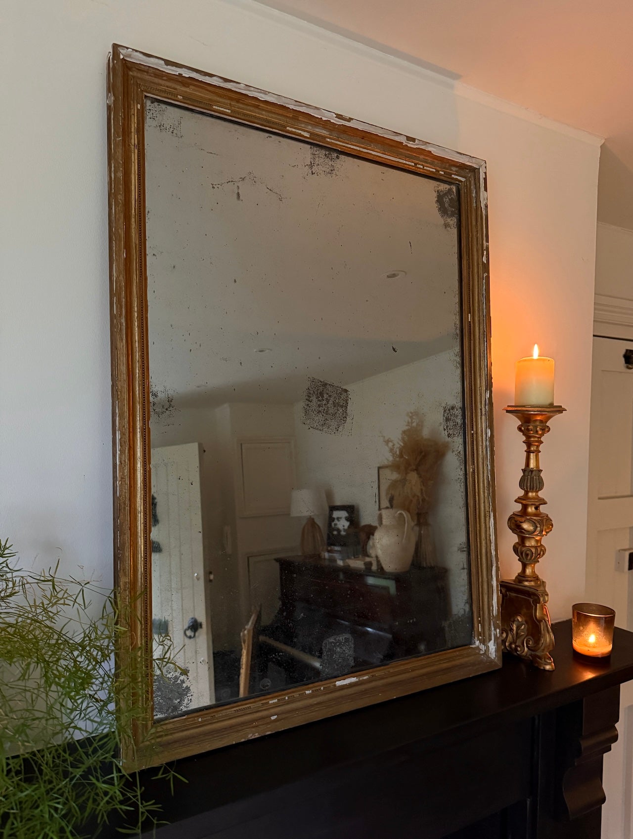 Foxed French gilt mirror