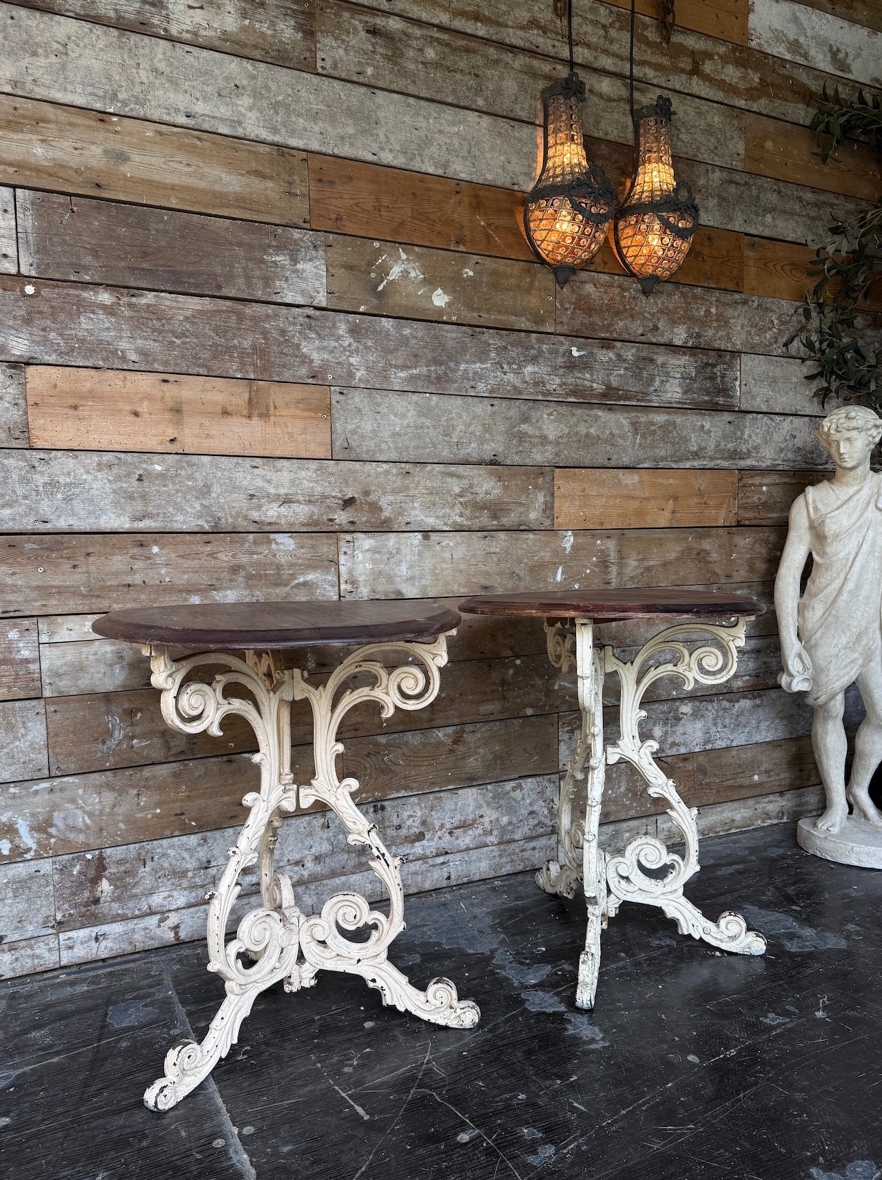 Pair of cast iron occasional tables