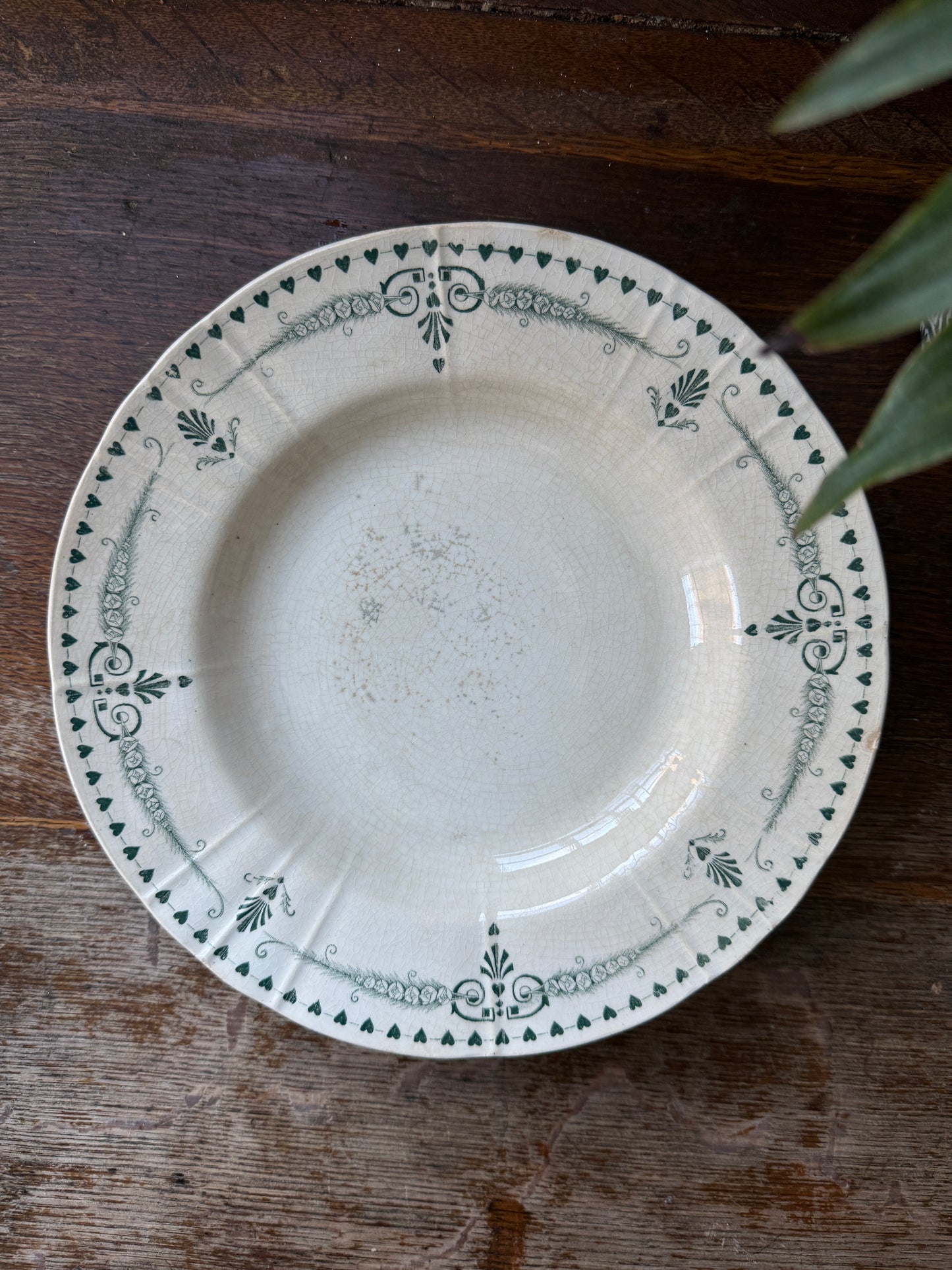 Four pretty vintage French side plates