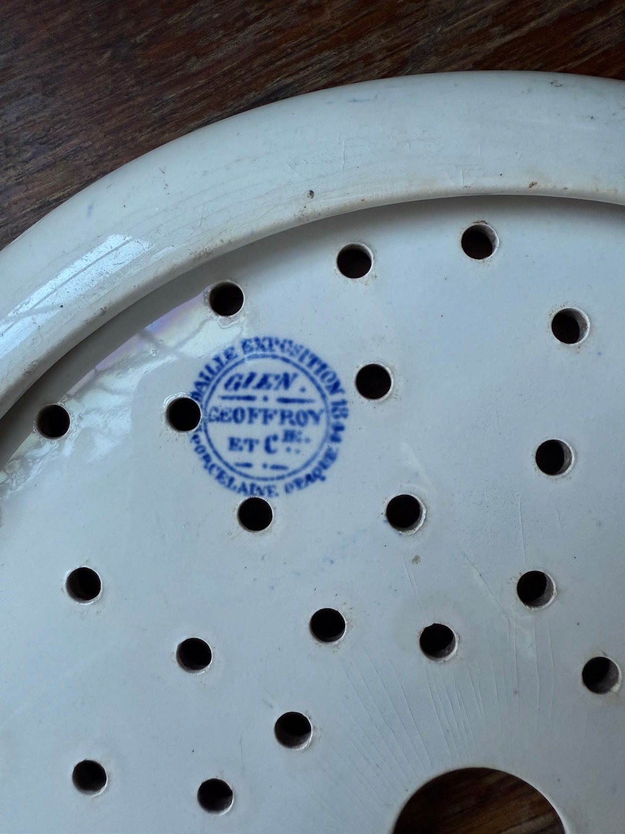Antique French ironstone strainer