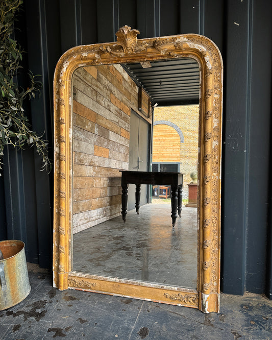 Beautifully rustic, big foxed French mirror