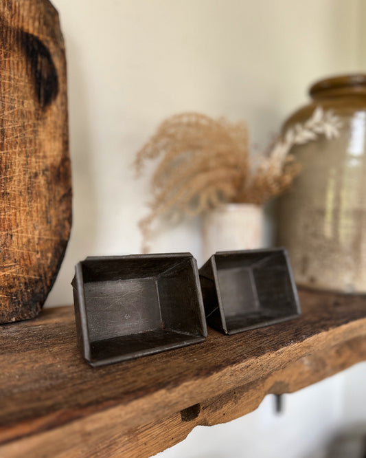 A pair of individual French loaf / cake tins