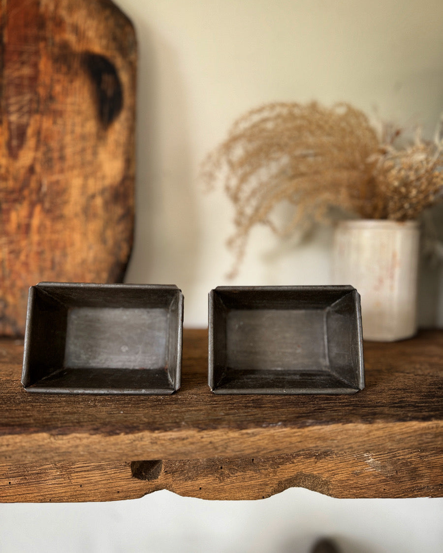 A pair of individual French loaf / cake tins