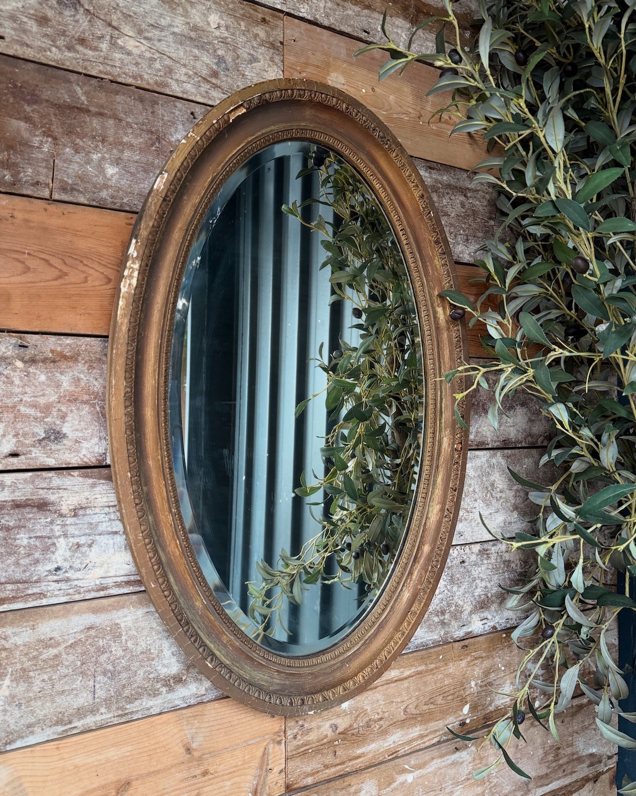 Rustic French oval mirror