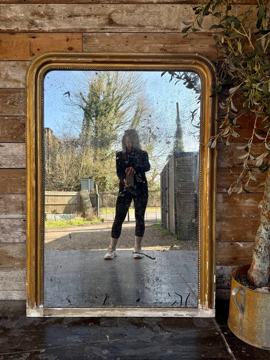 Beautifully foxed French gilt mirror