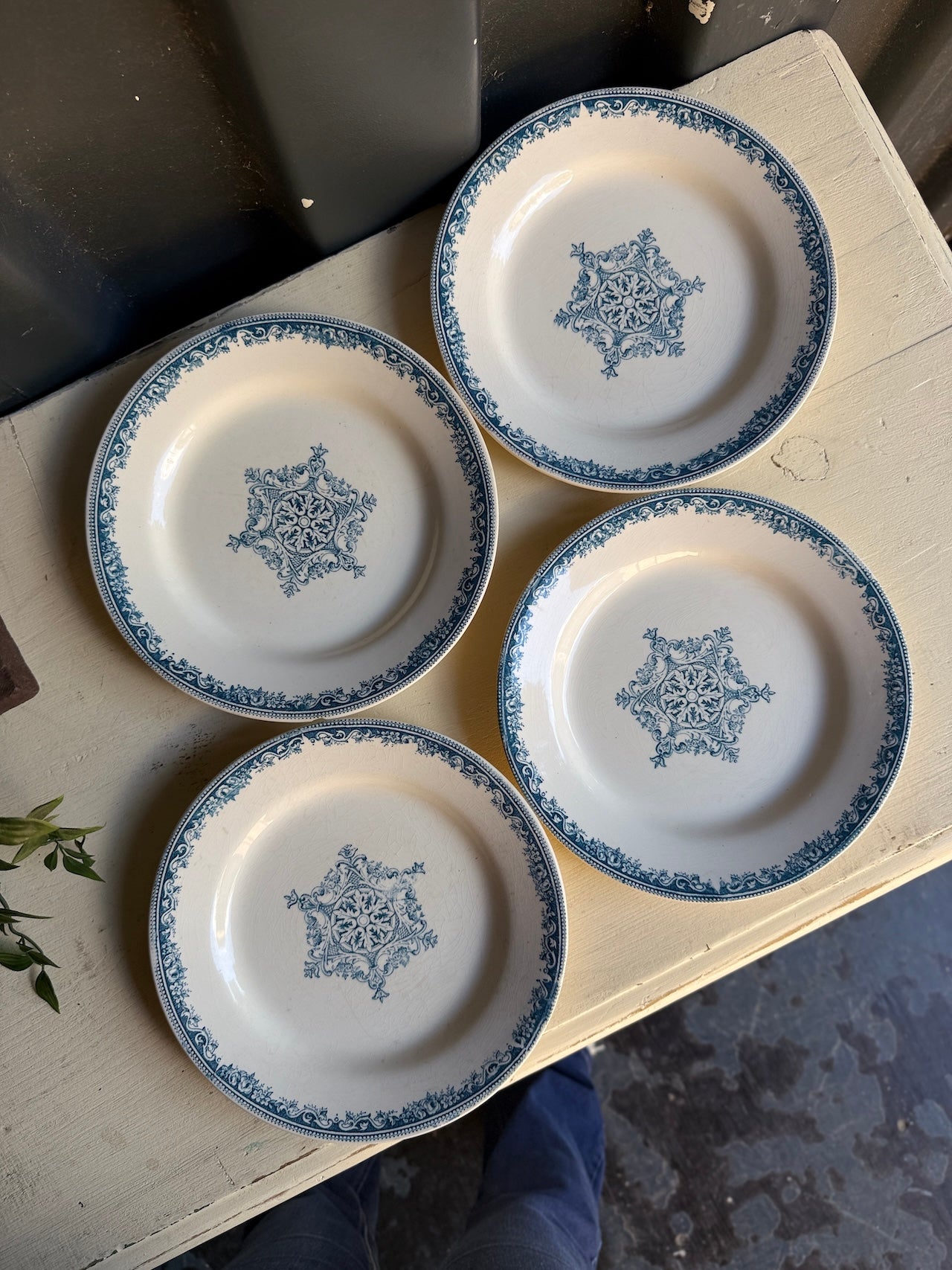 Four pretty vintage French side plates