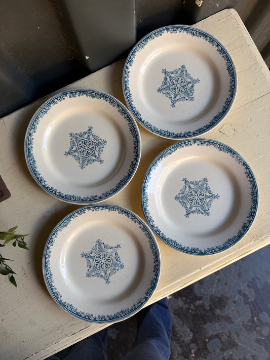 Four pretty vintage French side plates