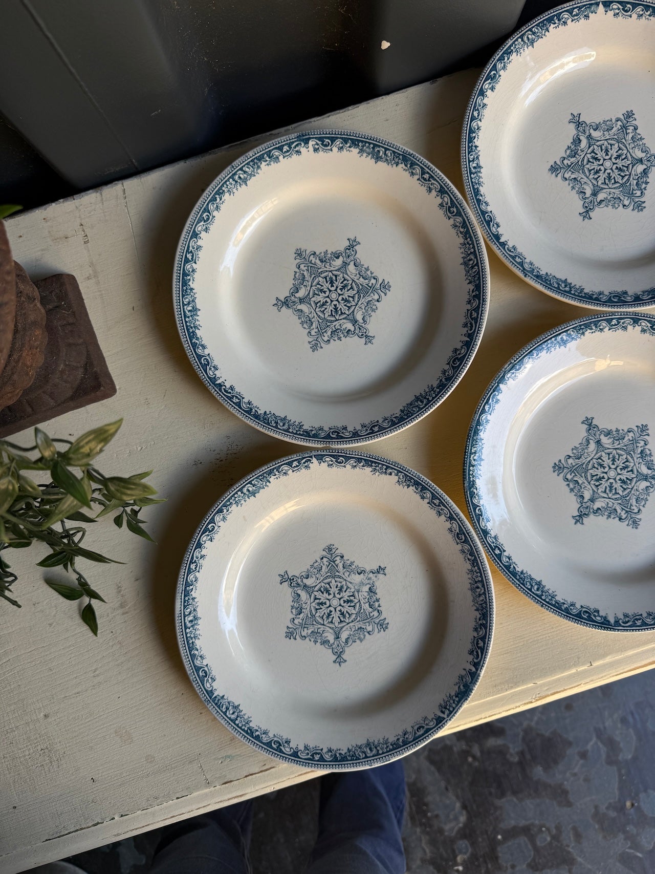 Four pretty vintage French side plates