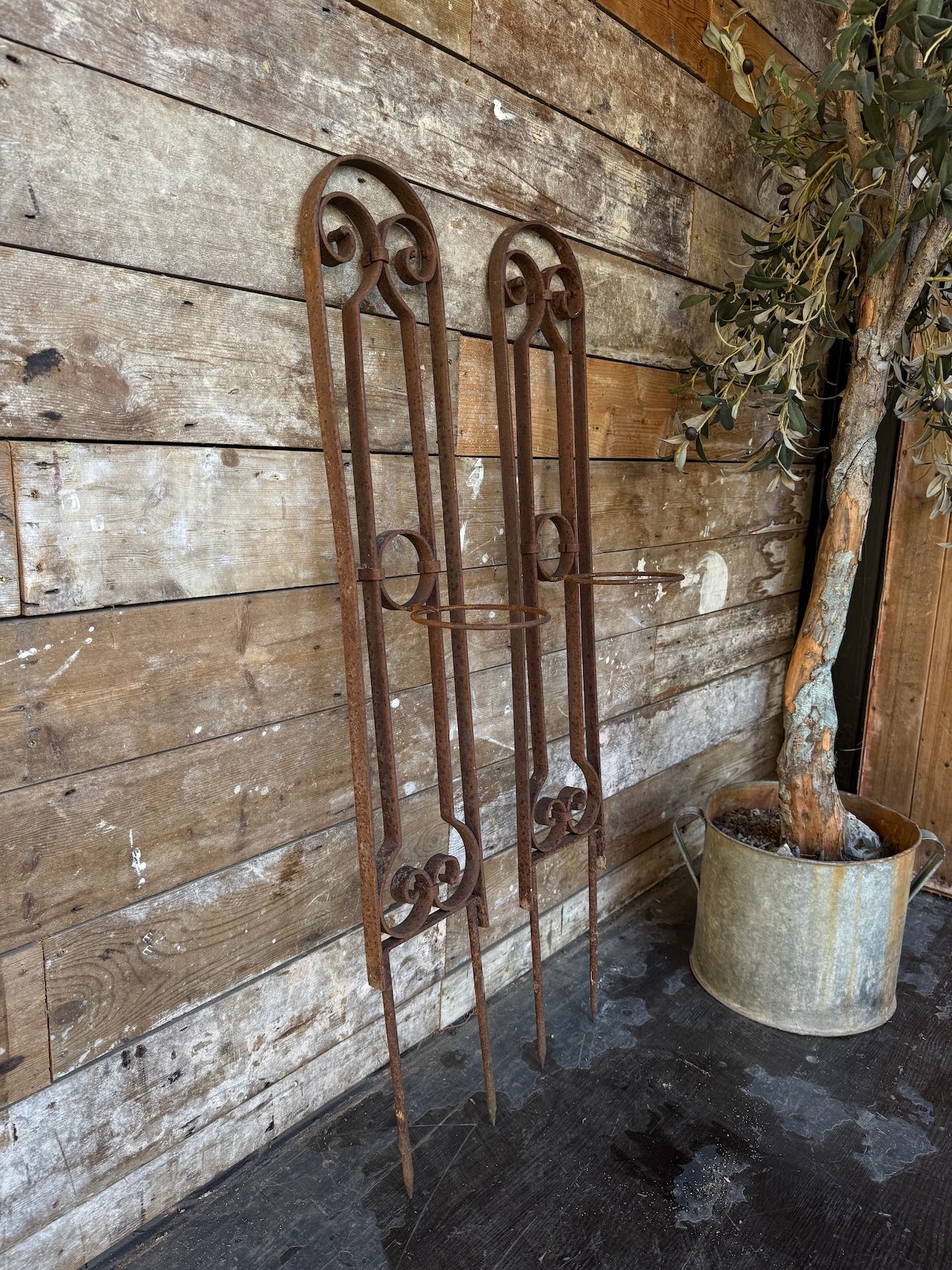 Pretty pair of rusted steel planters
