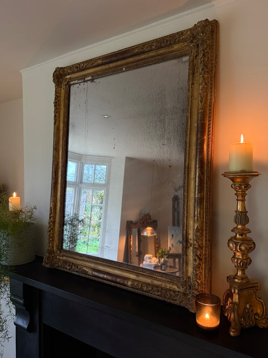 Large Foxed French gilt mirror