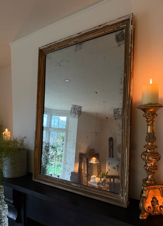 Foxed French gilt mirror