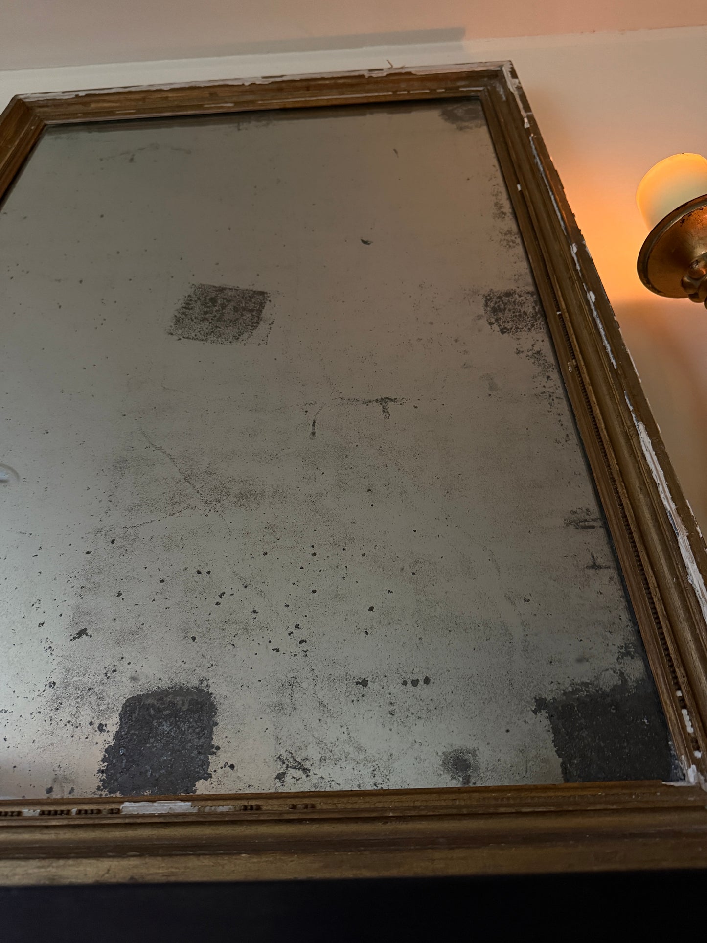 Foxed French gilt mirror