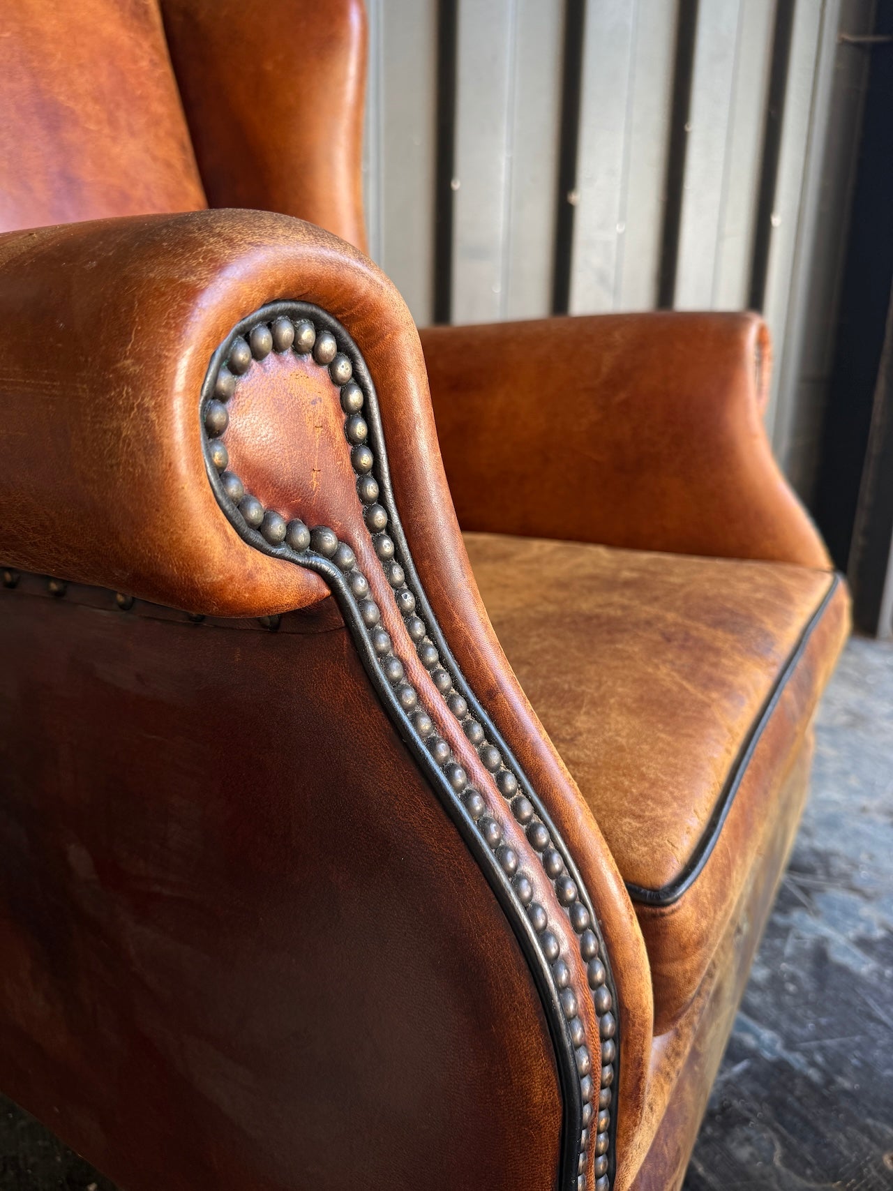 Dutch Vintage Leather Wingback Chair + Footstool