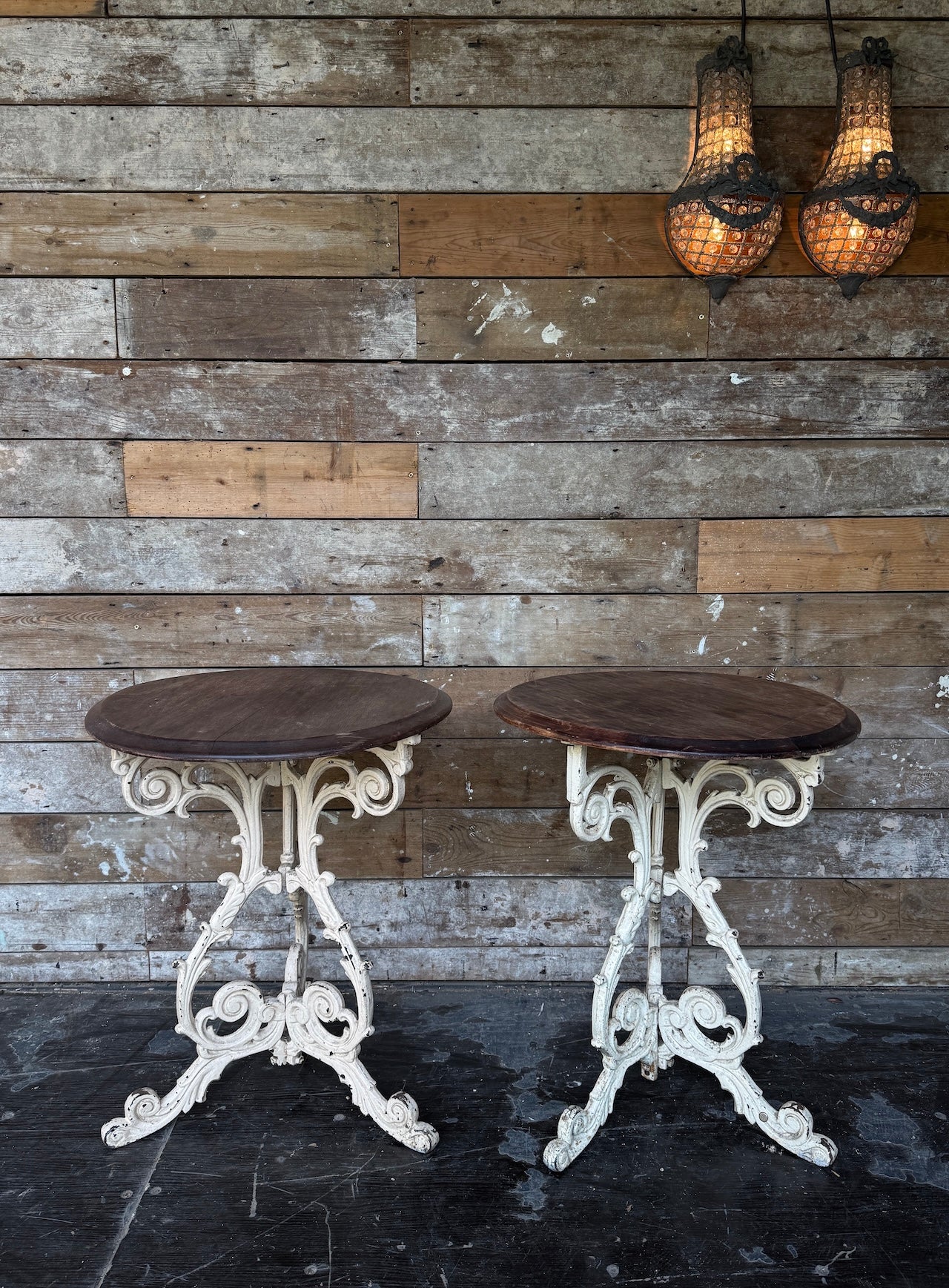 Pair of cast iron occasional tables