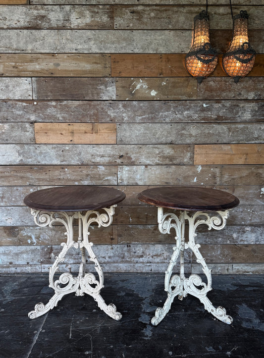 Pair of cast iron occasional tables