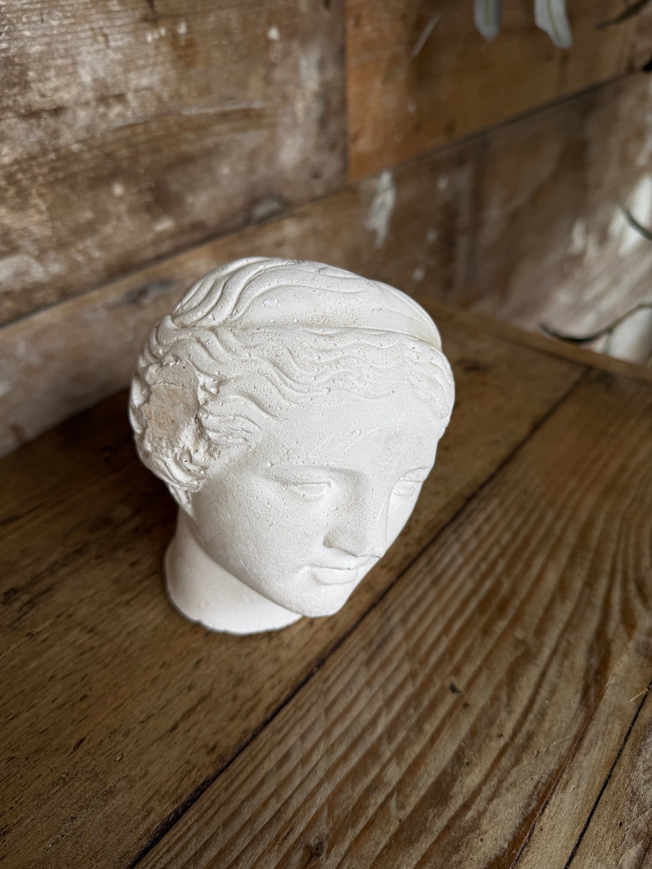 Decorative small plaster head