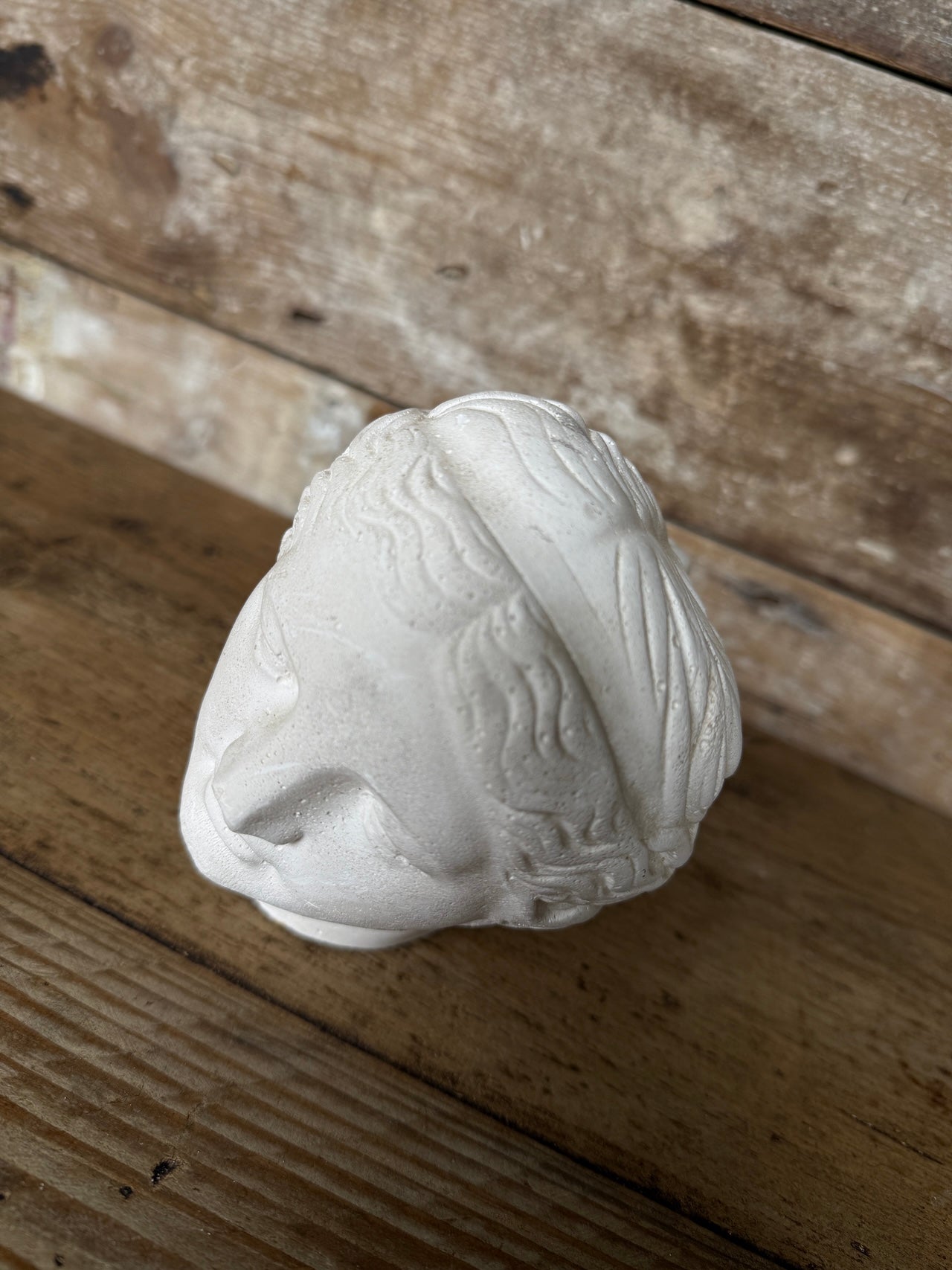 Decorative small plaster head