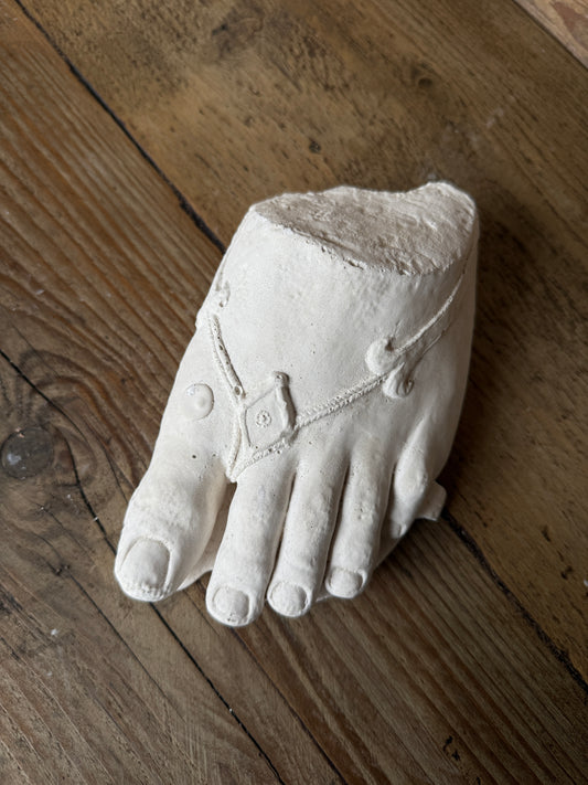 Plaster foot sculpture