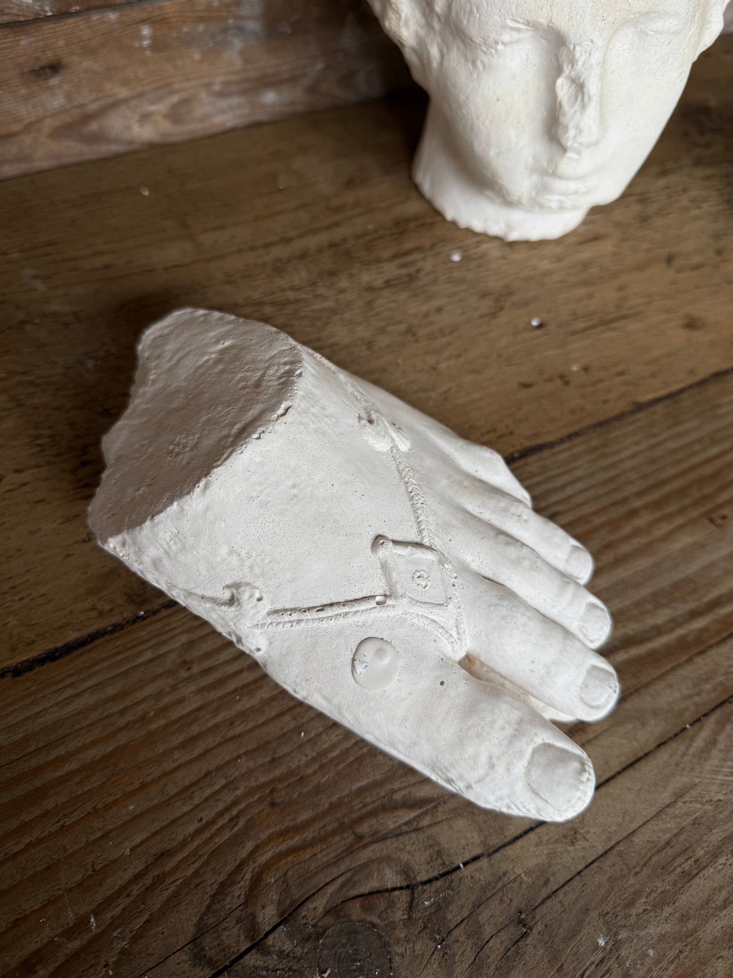 Plaster foot sculpture