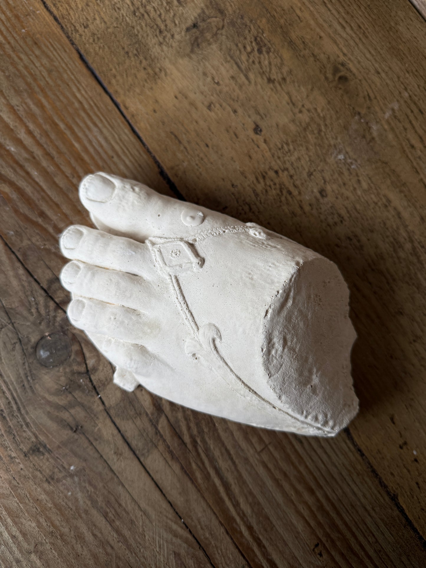Plaster foot sculpture