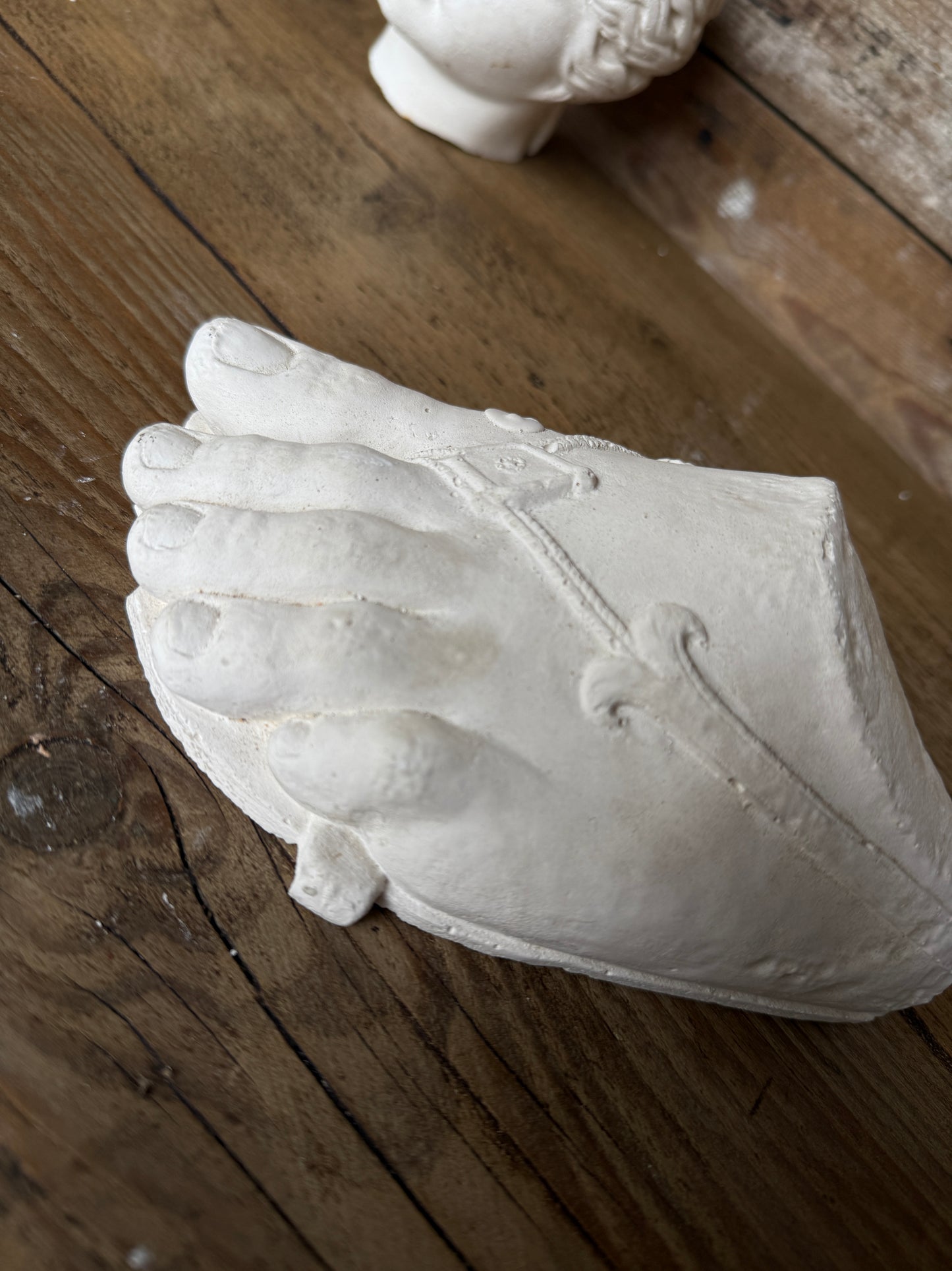 Plaster foot sculpture
