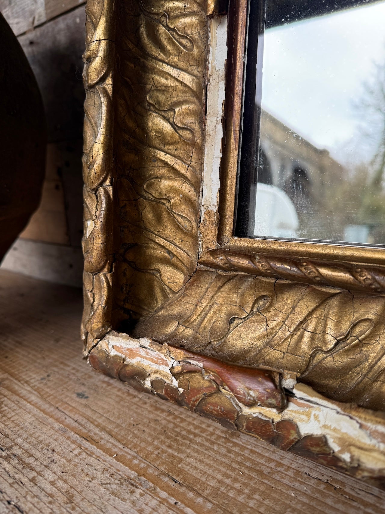 Foxed French gilt mirror